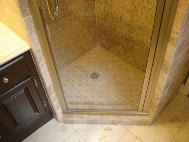 Shower Stall Curb - Drain through glass door